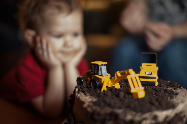 When he first saw the cake, two year old Everett placed his elbows on the table and just stared at the cake dreamily.